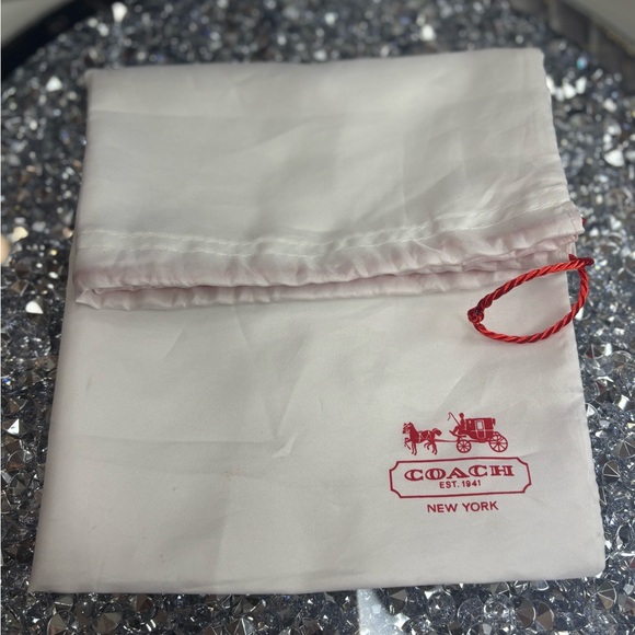 Coach Handbags - Coach White dust Bag with Red Logo